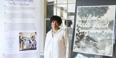 Doreen Wade with a part of her exhibit at the Negro Election Day commemoration   Salem United Inc.