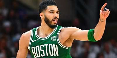 GETTY IMAGESImage caption: Jayson Tatum had 33 points, 13 rebounds and six assists for the Celtics