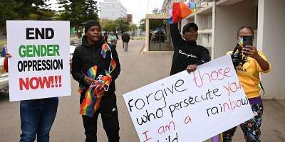 LGBTQ activists in Botswana respond to the Coalition of Botswana Christian Churches against homosexuality, July 22, 2023 that protested legislation seeking to make same-sex relation legal. - AFP - MONIRUL BHUIYAN