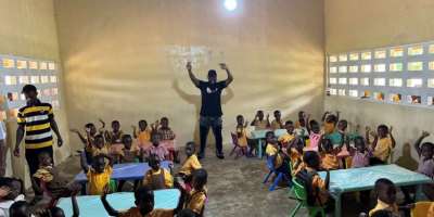 Medikal donate tables, chairs, other items to Oduman Asuaba MA Basic School