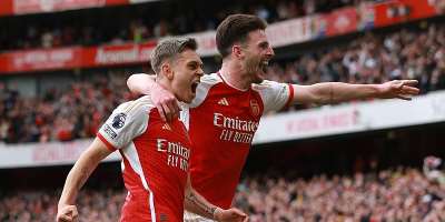 LONDON, ENGLAND - MAY 4: Leandro Trossard of Arsenal celebrates scoring the second goal with Declan Rice during the Premier League match between Arsenal FC and AFC Bournemouth at Emirates Stadium on May 4, 2024 in London,Image credit: Getty Images