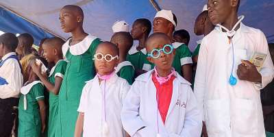Children of Tongor Tsanakpe DA Basic School in the South Dayi District of the Volta Region on stage in their preferred career outfits during the Kids Festival.
