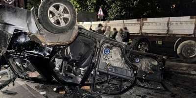This handout photograph published on July 9, 2026 shows an overturned Ukrainian army conscription vehicle in Lviv following unrest that erupted after officers detained a man suspected of evading military service and took him to a draft centre on July 8, 2026. -  Ukrainian Prosecutor Generals office via AFP