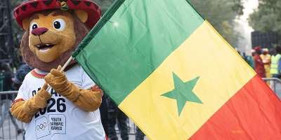 Ayo, the mascot of the Dakar 2026 Youth Olympic Games, awaits the arrival of Senegals national football team for a reception at the Palais de la Republique in Dakar on 20 January. - AFP - SEYLLOU