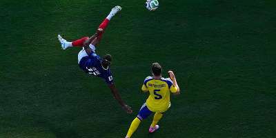 Michael OIise found the post with a spectacular bicycle kick during Frances crushing win over Sweden in the round of 32. - Petr David Josek, AP