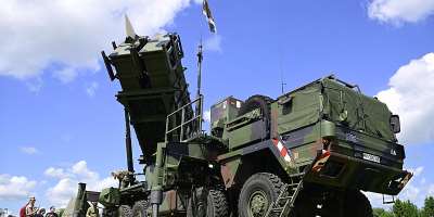 Visitors queue to take a closer look at a Patriot missile launcher during the Armed Forces Day at the Airbase in Laage, Germany, on June 06, 2026. -  John MacDougall, AFP