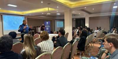Oleg Skripochka speaking at the panel
