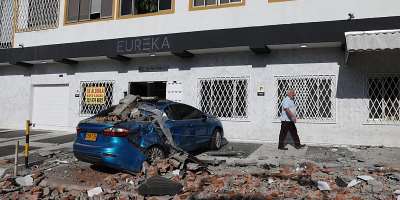 Debris covers a car after an earthquake struck Cali, Colombia, Monday, Aug. 10, 2026. -  Santiago Saldarriaga, AP