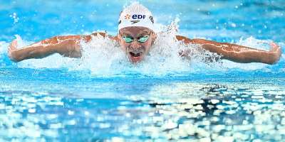 Frances Lon Marchand competes in the final of the mens 200m butterfly swimming event during the LEN European Aquatics Championships at the Olympic Aquatic Centre in Saint-Denis on August 15, 2026. -  Julien de Rosa, AFP