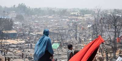 Rohingya refugees and humanitarians have faced unprecedented challenges in 2023, including fires, cyclones, and ongoing threats of monsoon-related disasters, putting their resilience to the test. Photo: IOM