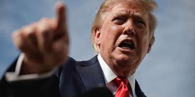 U.S. President Donald Trump gestures as he speaks to the media before boarding Air Force One at Joint Base Andrews in Maryland, U.S., en route to Myrtle Beach, South Carolina, August 21, 2026. -  Evan Vucci, Reuters