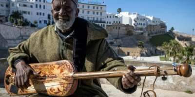 Abdellah El Gourd, a legend of gnawa, in the Moroccan city of Tangiers which will host 2024's International Jazz Day.  By FADEL SENNA AFP
