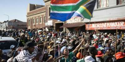 Anti-migrant protesters marched in a township outside Johannesburg.  By EMMANUEL CROSET (AFP)