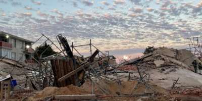 Dozens of people were still unaccounted for, after a building collapsed in South Africa.  By Willie van Tonder AFP