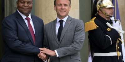 France's President Emmanuel Macron centre and his Centrafrican counterpart Faustin-Archange Touadera left are aiming for a 'constructive partnership', the French leader's office said.  By Bertrand GUAY AFP