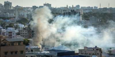 Heavy gunfire shook Somalias capital overnight and smoke rose over the city on Thursday.  By - (AFP)