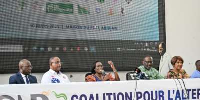Ivorian opposition leader Tidjane Thiam (2nd R) and former first lady Simone Ehivet Gbagbo (3rd L) are members of the coalition created to demand electoral reform ahead of October presidential elections.  By Sia KAMBOU (AFP)
