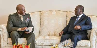 Ivorian President Alassane Ouattara R meets General Michael Langley, commander of US Africa Command.  By Issouf SANOGO AFP