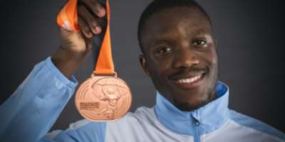 Letsile Tebogo from Botswana shows his 200 metres bronze medal after the 2023 world championships in Budapest..  By ANDREJ ISAKOVIC AFP