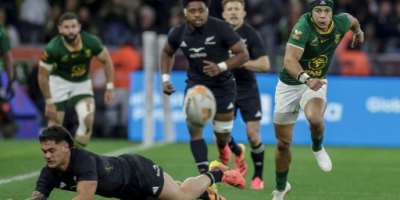 South Africa wing Cheslin Kolbe chases after the ball against New Zealand in Cape Town.  By GIANLUIGI GUERCIA (AFP)