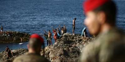 Spanish police and troops patrol the streets of Ceuta.  By Henry NICHOLLS (AFP)
