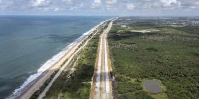 The Lagos-Calabar Coastal Highway runs parallel to the Atlantic Ocean -- and too close for comfort, critics say. By OLYMPIA DE MAISMONT (AFP)