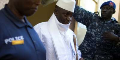 Yahya Jammeh (C) left the country in 2017 after losing the presidential election. By MARCO LONGARI (AFP)