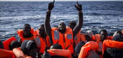 Safe at last, a rescued immigrant praises God