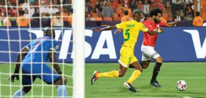 Egypt superstar Mohamed Salah attempts to unleash a trademark left-foot shot in the Africa Cup of Nations victory over Zimbabwe. By Khaled DESOUKI (AFP/File)