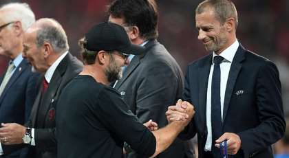 UEFA president Aleksander Ceferin (right) with Liverpool boss Jurgen Klopp (left)
