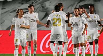 Real Madrid's Brazilian forward Vinicius Junior (R) celebtrates with teammates after scoring during the Spanish League football match Real Madrid CF against RCD Mallorca at at the Alfredo di Stefano stadium

Image credit: Getty Images
