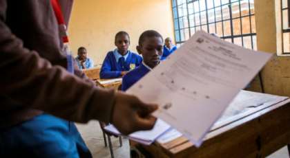 School's out: Primary and secondary pupils in Kenya have been told to return to class in January because of coronavirus. By PATRICK MEINHARDT (AFP)