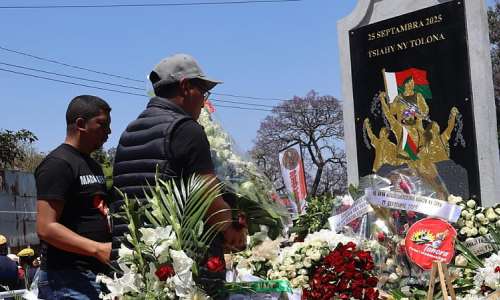 People pay their respects at a memorial unveiled in Antananarivo to mark the first anniversary of the popular uprising, led in part by Gen Z, which led to ousted President Andry Rajoelina fleeing the country, 25 September 2026. -  Guilhem Fabry/RFI