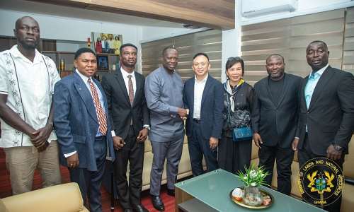 Minister for Lands and Natural Resources, Hon. Emmanuel Armah-Kofi Buah engages a delegation from Guangdong Shengmai Tech Co. Ltd
