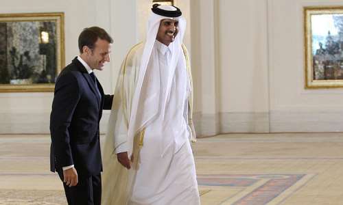 French President Emmanuel Macron with Qatar’s Emir Sheikh Tamim bin Hamad Al Thani in Doha on 7 December 2017. Macron returns to Qatar this week as part of a four-country Gulf tour. -  REUTERS/Naseem Zeitoon