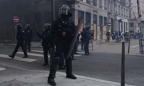 Riot police face protesters during a demonstration against rising living costs and in support of students’ grievances in Paris on October 17, 2026. -  Laurent Cipriani, AP