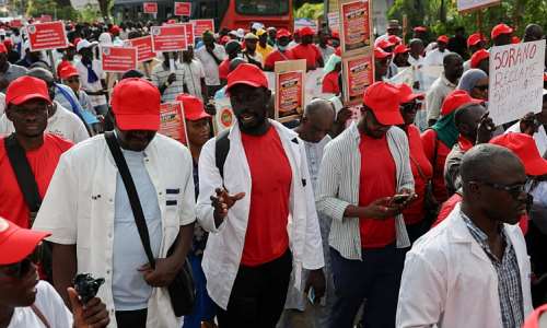 Members of Senegals FSDT union confederation march in Dakar to demand the implementation of labour agreements and reforms to the pension and social security systems. - REUTERS - Misper Apawu