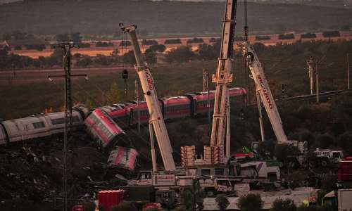 Emergency services worked overnight to sift through the wreckage of the train collision south of Madrid that left at least 68 people dead and more than 100 injured. -  Manu Fernandez / AP