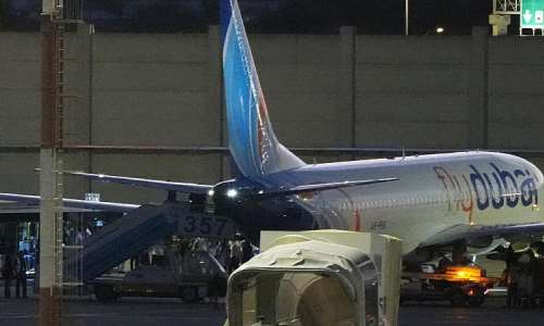 People disembark from a FlyDubai carrying Israeli passengers who had earlier been aboard another FlyDubai aircraft that made an emergency landing in Saudi Arabia approaches Ben Gurion International Airport near Tel Aviv, Israel, Wednesday, Sept. 30, 2026. -  Ariel Schalit, AP