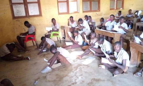 Gushegu Demonstration JSS pupils sit on bare floor for exams over lack of furniture