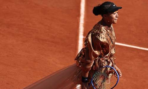 Japans Naomi Osaka arrives on court for her womens singles match against the USAs Iva Jovic on day seven of the French Open tennis tournament at the Roland-Garros Complex in Paris on May 30, 2026. -  Anne-Christine Poujoulat, AFP