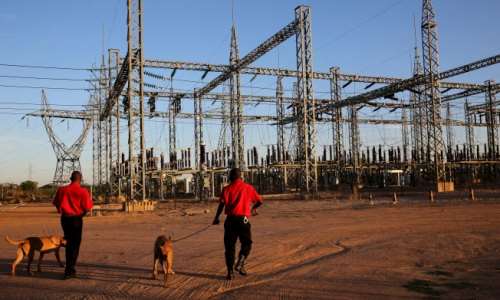 Security guards arrive for their shift at a power station outside Gaborone, Botswana, on November 23, 2015. Journalists in Botswana said they will remain vigilant after the passage of a new surveillance law in February 2022. ReutersSiphiwe Sibeko