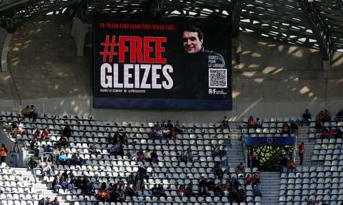 A message of support for jailed journalist Christophe Gleizes at a Ligue 1 football match in Paris, on May 3, 2026. -  Franck Fife, AFP
