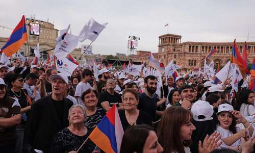 Supporters of Russian-Armenian tycoon Samvel Karapetyan attend a rally with Armenian national flags against incumbent Prime Minister Nikol Pashinyan at Republic Square in Yerevan, Armenia, on June 3, 2026. -  Anthony Pizzoferrato, AP
