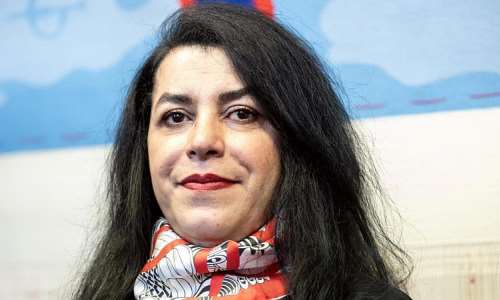 French-Iranian graphic novelist and illustrator Marjane Satrapi poses during the unveiling of an Olympic triptych tapestry created for the Paris 2024 Olympic Games, designed from a drawing by Satrapi, at the Mobilier National (National Furniture) in Paris on March 12, 2024. -  Bertrand Guay, AFP (archive)