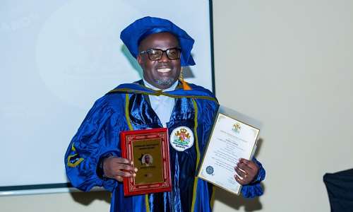 Mr. Maxwell Commey, CEO of Oro Oil Ghana Limited displays his award