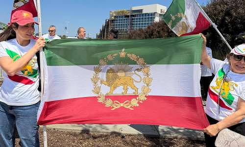 The flag of the pre-1979 Islamic revolution, featuring a lion and a sun, is banned from stadiums at the World Cup
