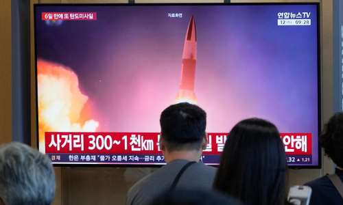 A TV screen shows a file image of North Koreas missile launch during a news program at Seoul Railway Station on August 12, 2026. -  Ahn Young-joon, AP
