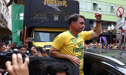 Flavio Bolsonaro greets supporters during a rally in Juiz de Fora, where his father was stabbed, on September 9, 2026. -  Pilar Olivares, Reuters