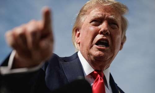 U.S. President Donald Trump gestures as he speaks to the media before boarding Air Force One at Joint Base Andrews in Maryland, U.S., en route to Myrtle Beach, South Carolina, August 21, 2026. -  Evan Vucci, Reuters